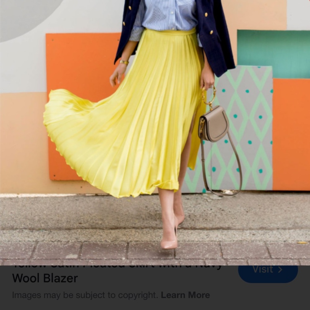 Yellow Pleated Skirt by Abbott Elementary